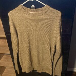 small brown knitted sweater